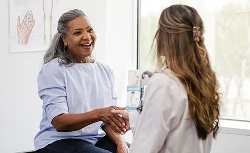 primary care doctors near syracuse ny compassionate family medicine doctor talking with patient