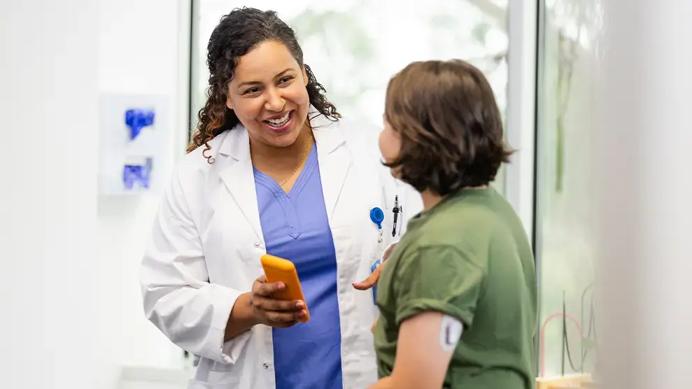 diabetes near syracuse ny compassionate family medicine doctor talking with patient.webp