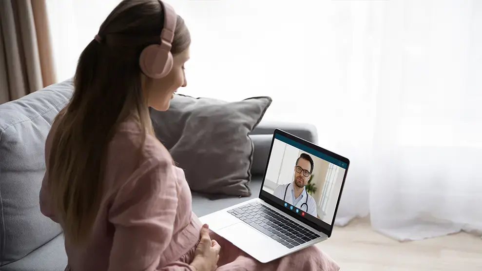 telehealth appointments near syracuse ny compassionate family medicine meeting doctor on computer.webp